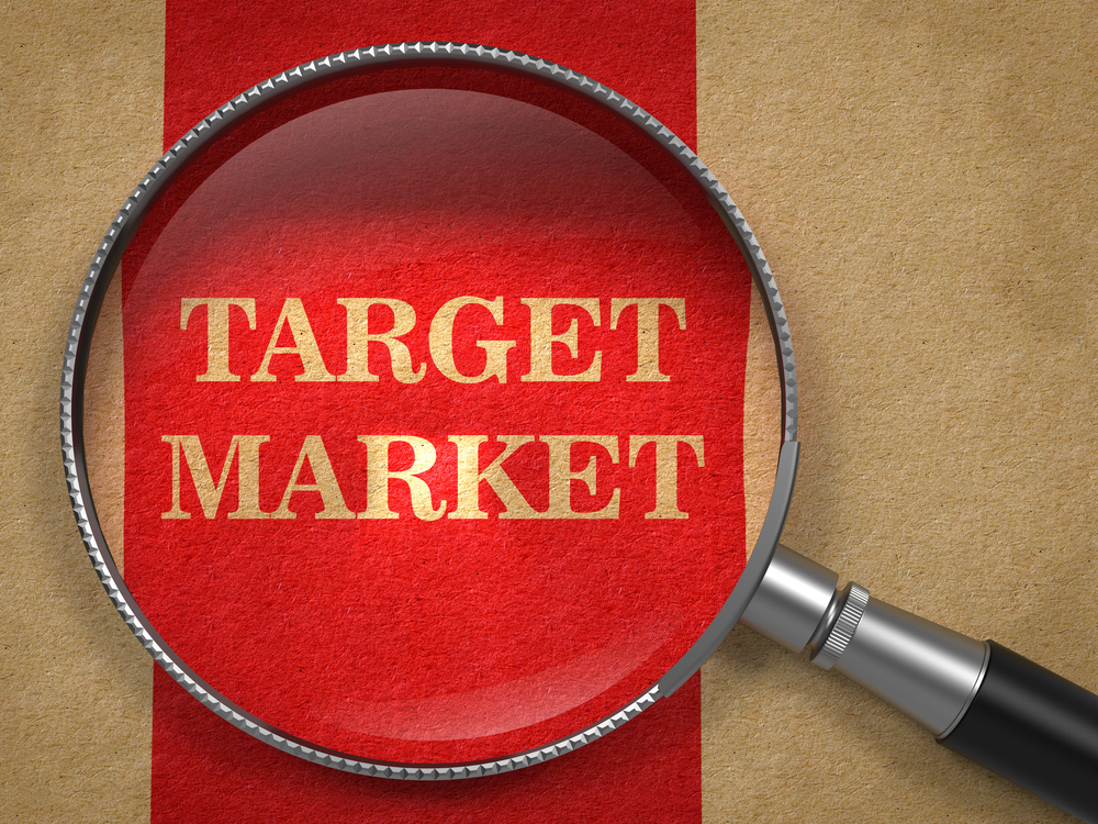 Target Market - Magnifying Glass on Old Paper with Red Vertical Line.-1